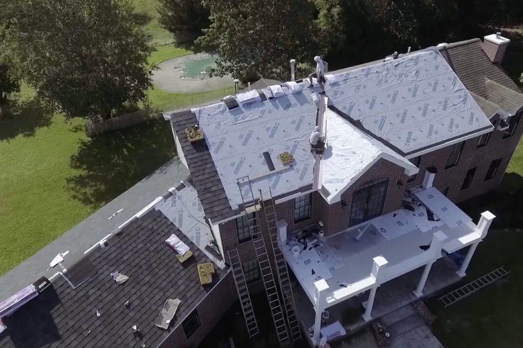 red brick house with CertainTeed Belmont Shingles