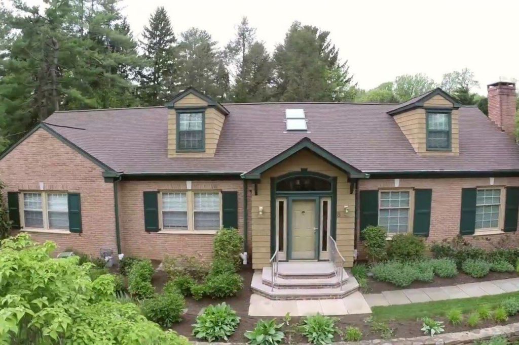 Bryn Mawr Pa home with red brick and LandMark Pro Shingles