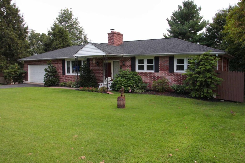 red brick house with LandMark Pro Shingles Phoenixville Pa